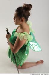 KATERINA KNNELING POSE WITH SWORD